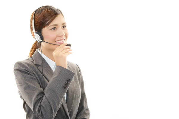 Operador de call center sorridente — Fotografia de Stock