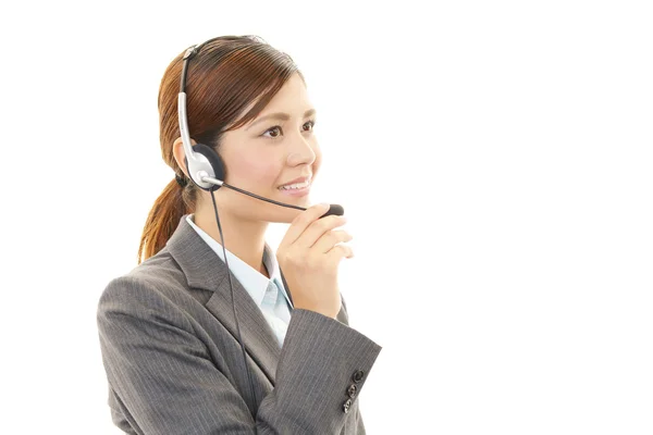 Operador de call center sorridente — Fotografia de Stock