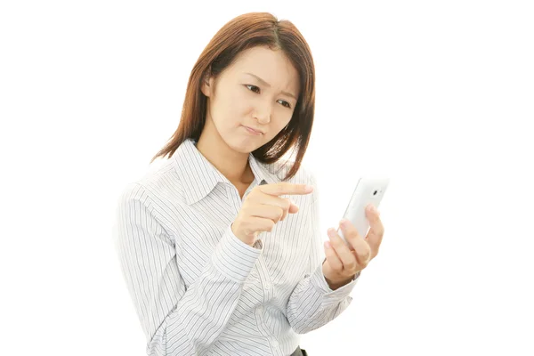 The woman with smart phone — Stock Photo, Image