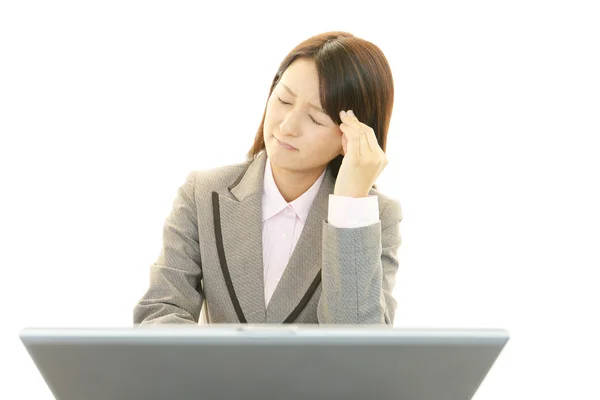 Business woman with headache — Stock Photo, Image