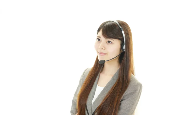 Smiling call center operator — Stock Photo, Image