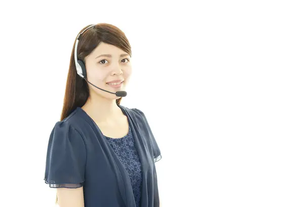 Smiling call center operator — Stock Photo, Image