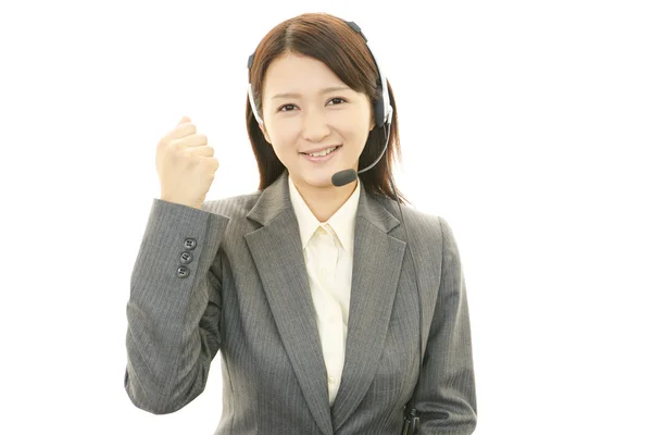 Operador de call center sorridente — Fotografia de Stock