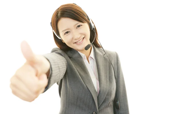 Operador de call center sorridente — Fotografia de Stock