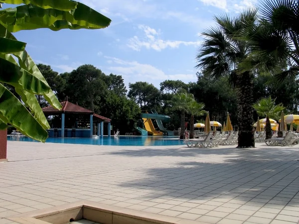 Poolside of tropical water park — Stock Photo, Image