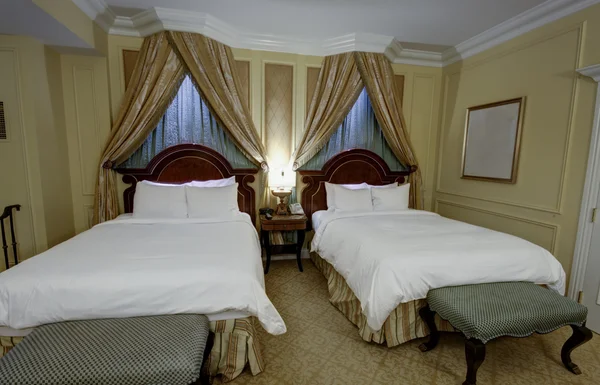 Bedroom with canopy two king-size beds — Stock Photo, Image