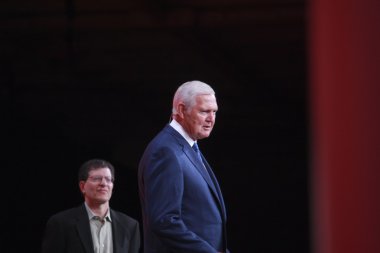 Legendary American basketball player Jerry West (right) welcomes Oracle OpenWorld conference in Moscone center clipart