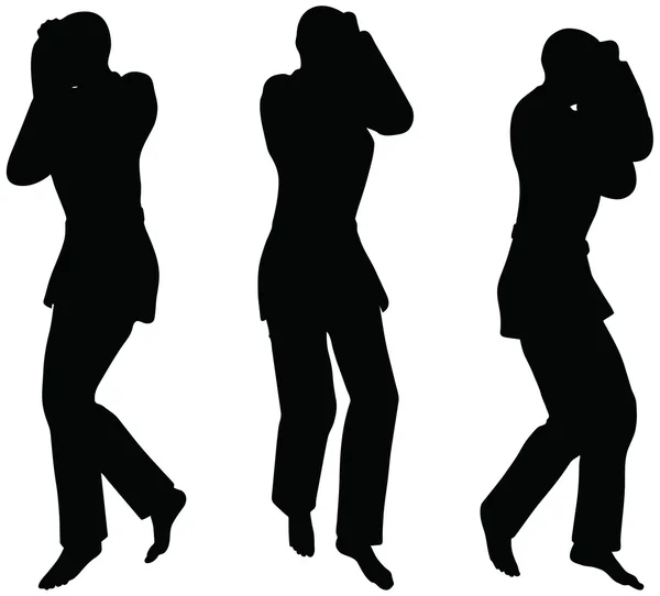 Karate martial art silhouettes of men and women in fist fight karate poses Royalty Free Stock Vectors