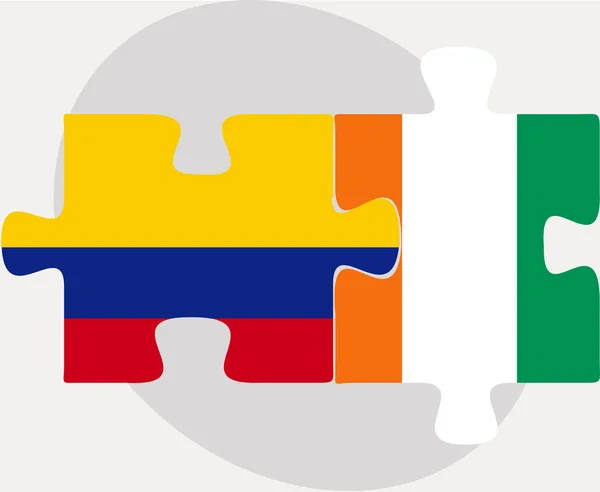 Kolumbie a Pobřeží slonoviny vlajky v puzzle — Stockový vektor