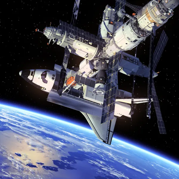 Transbordador espacial y estación espacial . Fotos de stock