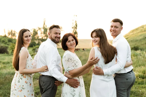 Loving Young Family Hugging Smiling Together Background Nature Portrait Family — Stock Photo, Image