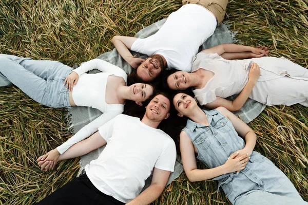 Group People Lying Ground Top View Middle Aged Family Resting — Stock Photo, Image