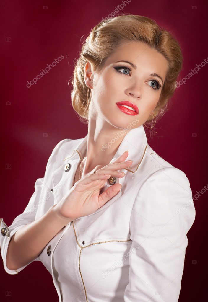 Alluring Blonde Woman In Pin Up Retro Sailor Costume With Bright