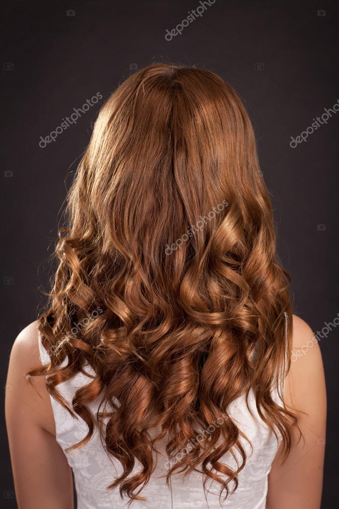 Beautiful Long Hair Brunette Woman With Healthy Curly Dark