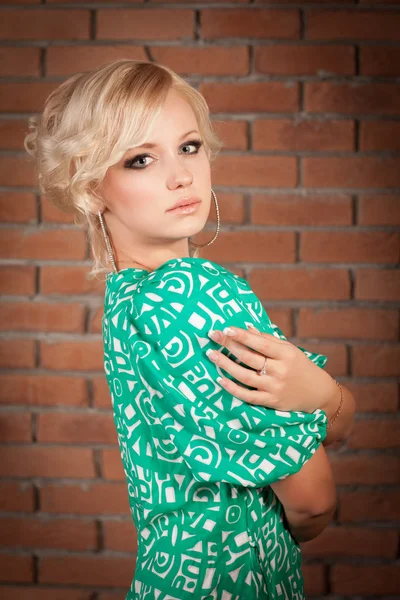 Beautiful blonde woman in casual Fashion summer dress with hairstyle makeup big earrings . Sales and Discounts Concept. Alluring american girl teenager in blouse spring collection. Shopping Mall. — Stock Photo, Image