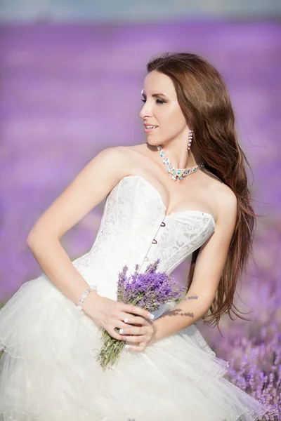 Beautiful Bride in wedding day in lavender field — Stock Photo, Image