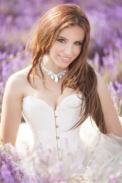 Beautiful Bride in wedding day in lavender field — Stock Photo, Image