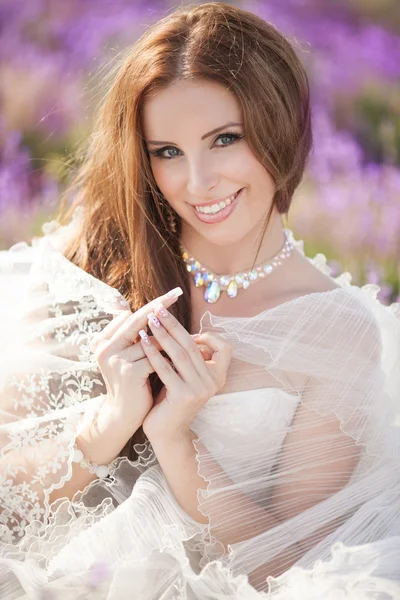 Beautiful Bride in wedding day in lavender field Royalty Free Stock Images