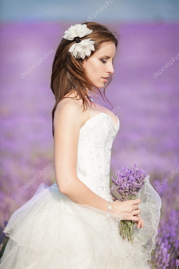 Beautiful Bride in wedding day in lavender field