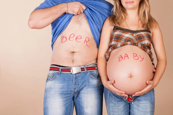 Belly of pregnant wife and husband — Stock Photo, Image