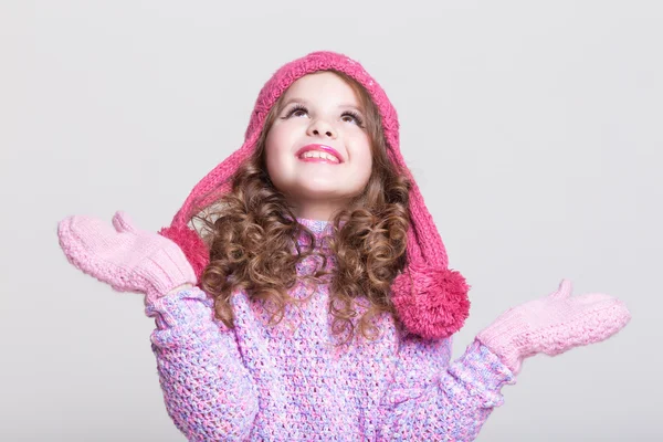 Cute little girl in winter woolen accessories. — Stock Photo, Image