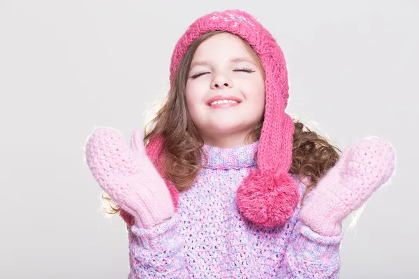 Cute little girl in winter woolen accessories. — Stock Photo, Image