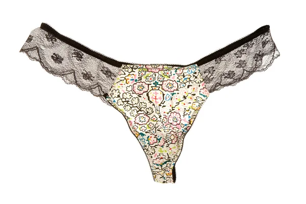 Naif flowers and black lacework transparent panties — Stock Photo, Image