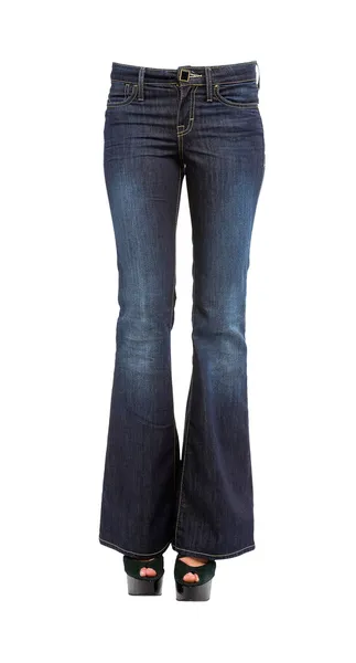 Young woman legs in bell bottom jeans and platform peep toe stil — Stock Photo, Image