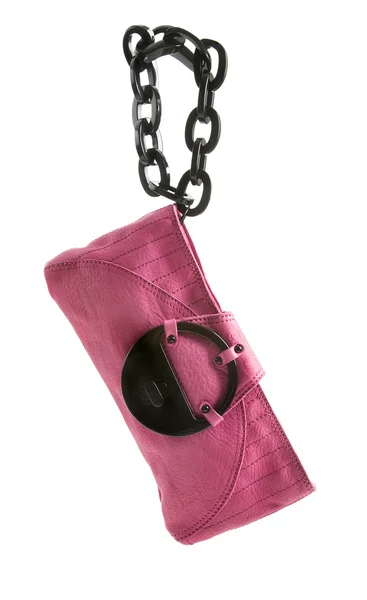 Bolso de mano de cuero rosa con cadena de plástico de eslabones grandes negro — Foto de Stock