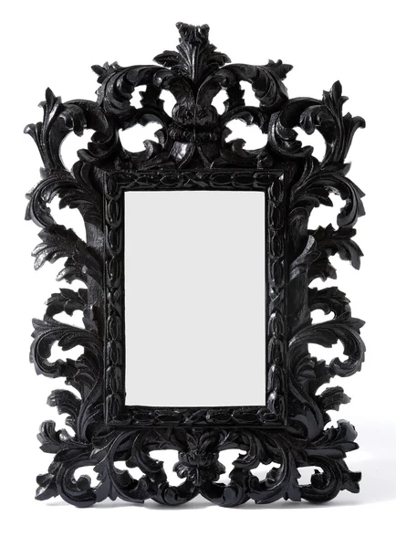 Cadre miroir baroque en bois sculpté peint en noir — Photo