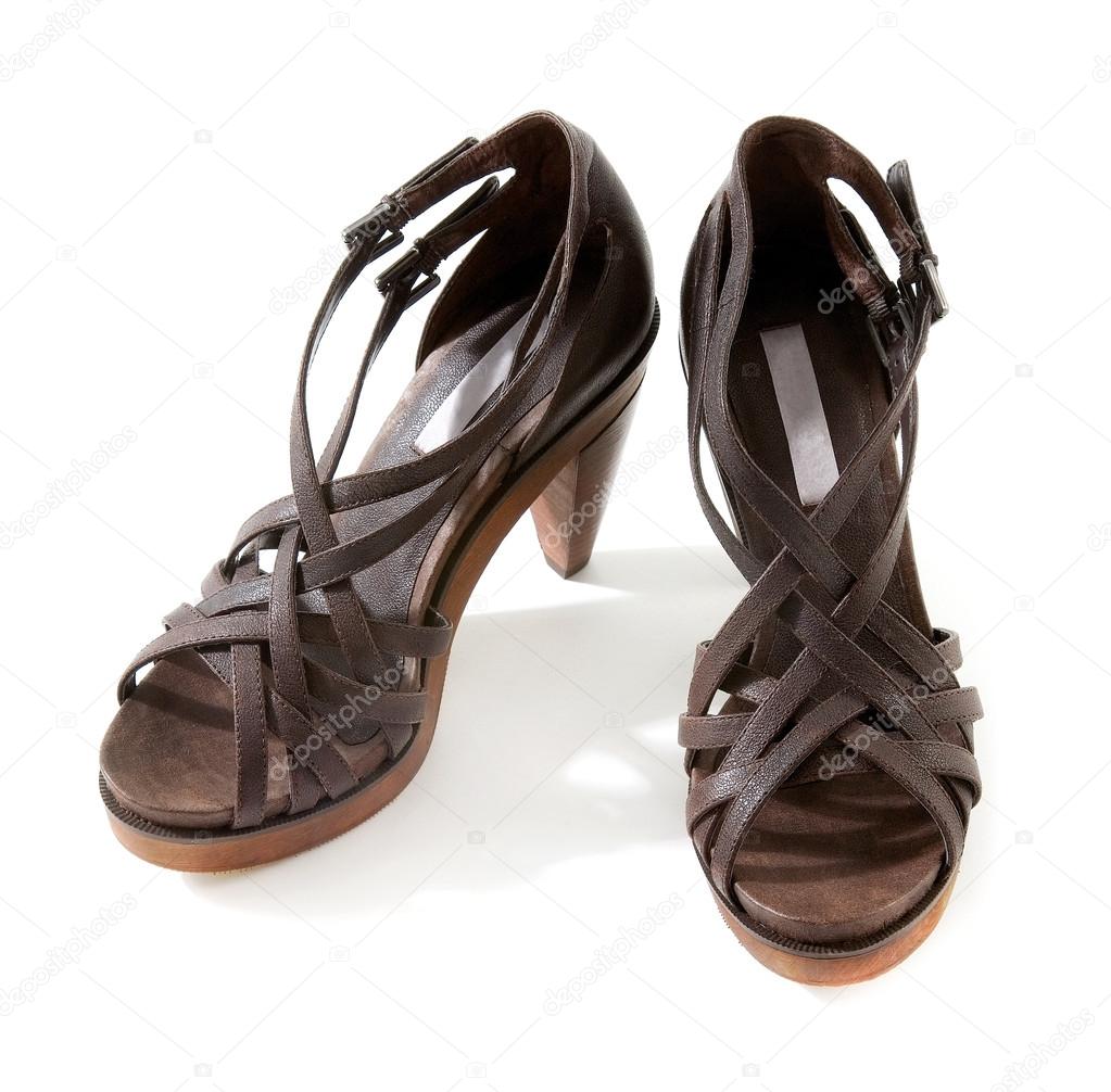 Wooden high heeled brown leather sandals pair