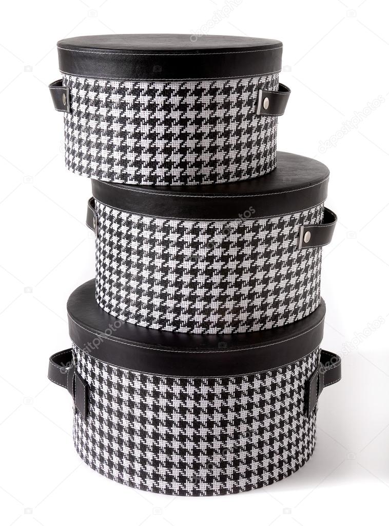 Set of houndstooth check and black leather bandboxes