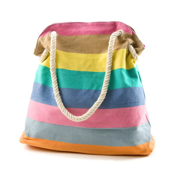 Bolso de playa rayado multicolor de lona con correa de hombro de cuerda — Foto de Stock