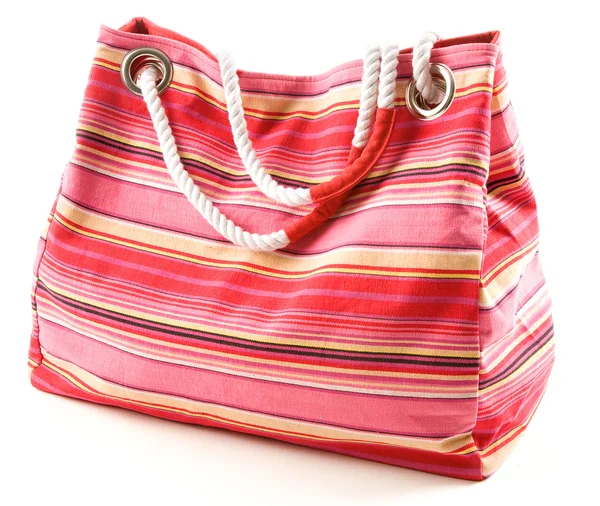 Pinkish canvas striped beach bag with rope shoulder strap — Stock Photo, Image