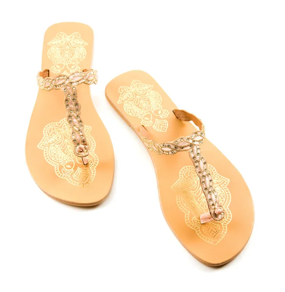 Golden birds and strass flip flop sandals — Stock Photo, Image