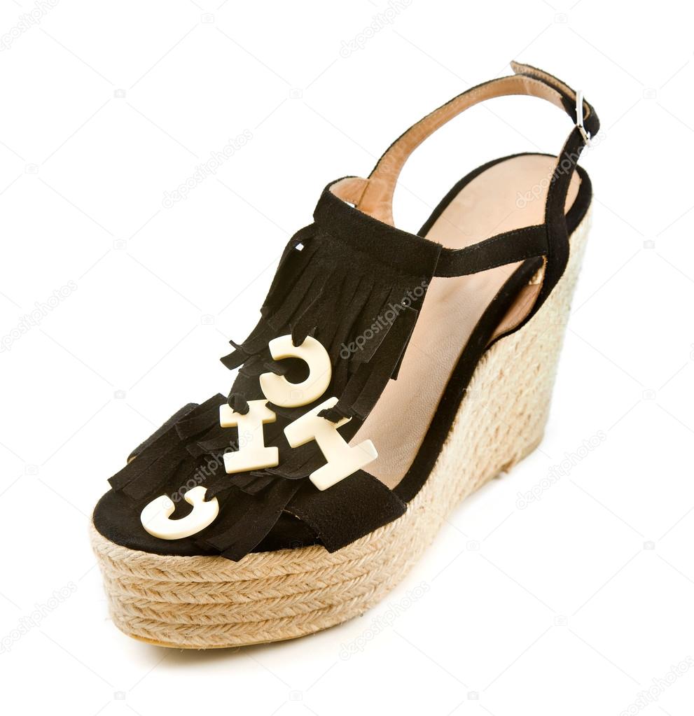 Raffia wedged fringed flip flop sandals with the word CHIC