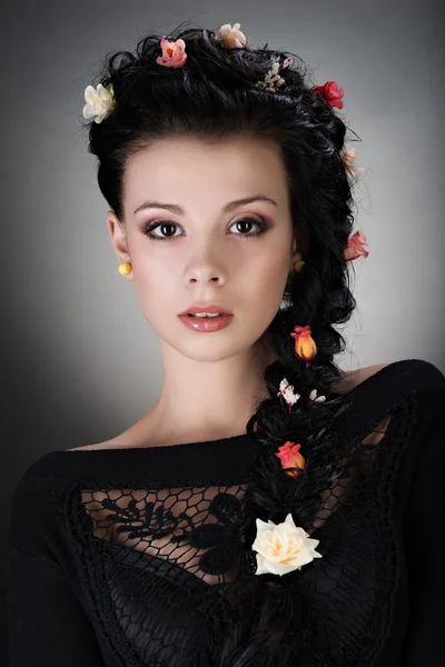 Portrait of young brunette girl with long hair — Stock Photo, Image