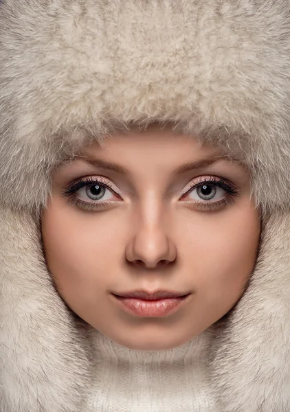 Portrait of a girl in a fur hat — Stock Photo, Image
