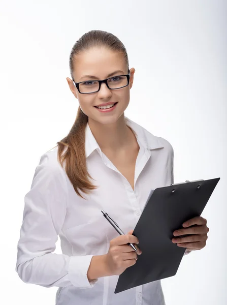 Secretaria joven en el trabajo en la oficina —  Fotos de Stock