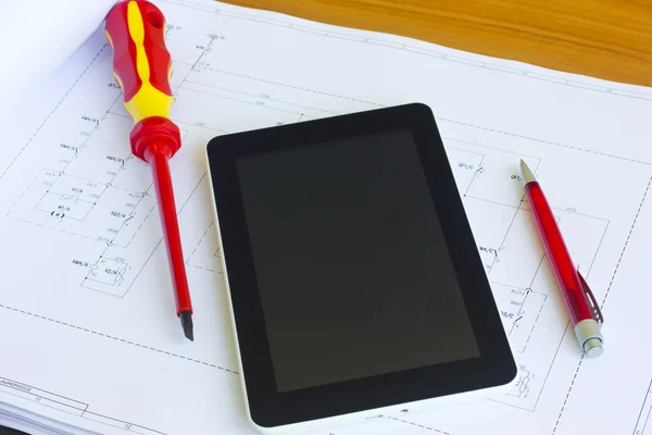 Tablet over engineering diagram — Stock Photo, Image