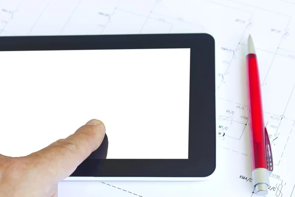 Man working with tablet over engineering diagram — Stock Photo, Image