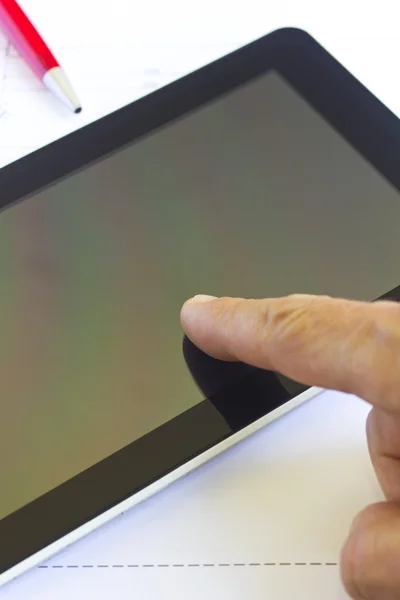 Man working with tablet over engineering diagram — Stock Photo, Image