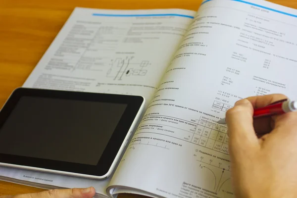 Man working with tablet over engineering diagram — Stock Photo, Image