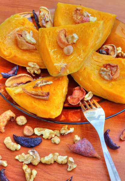 Baked pumpkin with dried fruits and nuts — Stock Photo, Image