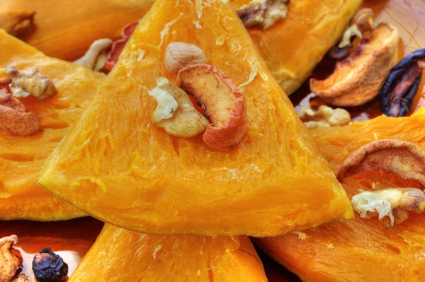 Baked pumpkin with dried fruits and nuts — Stock Photo, Image