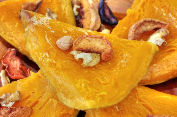Baked pumpkin with dried fruits and nuts — Stock Photo, Image