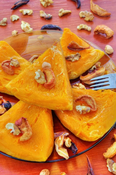 Baked pumpkin with dried fruits and nuts — Stock Photo, Image