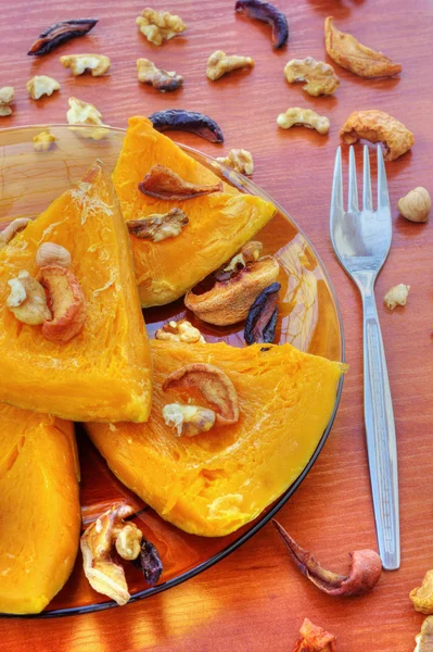 Baked pumpkin with dried fruits and nuts — Stock Photo, Image