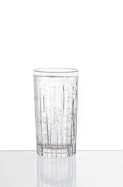 One clear glass with sparkling water — Stock Photo, Image