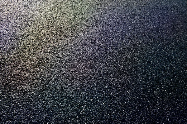 Detalhe asfalto preto como pano de fundo — Fotografia de Stock